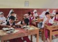 Para siswa SDN Kertajaya, Kecamatan Cibatu, Kabupaten Garut, menyantap hidangan lezat dalam program Makan Bergizi Gratis (MBG)/Dok Dinas Pendidikan Kabupaten Garut