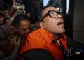 Immanuel Ebenezer Gerungan (IEG) saat menjabat sebagai Wakil Menteri Ketenagakerjaan memakai baju tahanan/Hukumonline.com