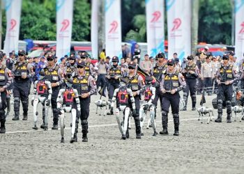 Ilustrasi Defile Robot Humanoid dan Anjing Robot K9 pada Upacara HUT ke-79 Bhayangkara di Kawasan Monas, Jakarta, Selasa (1/7/2025)