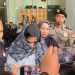 Bupati Pekalongan, Fadia Arafiq saat keluar dari Gedung Merah Putih KPK dengan memakai baju orange tahanan KPK. (Foto: Ainul Ghurri/Kabariku)